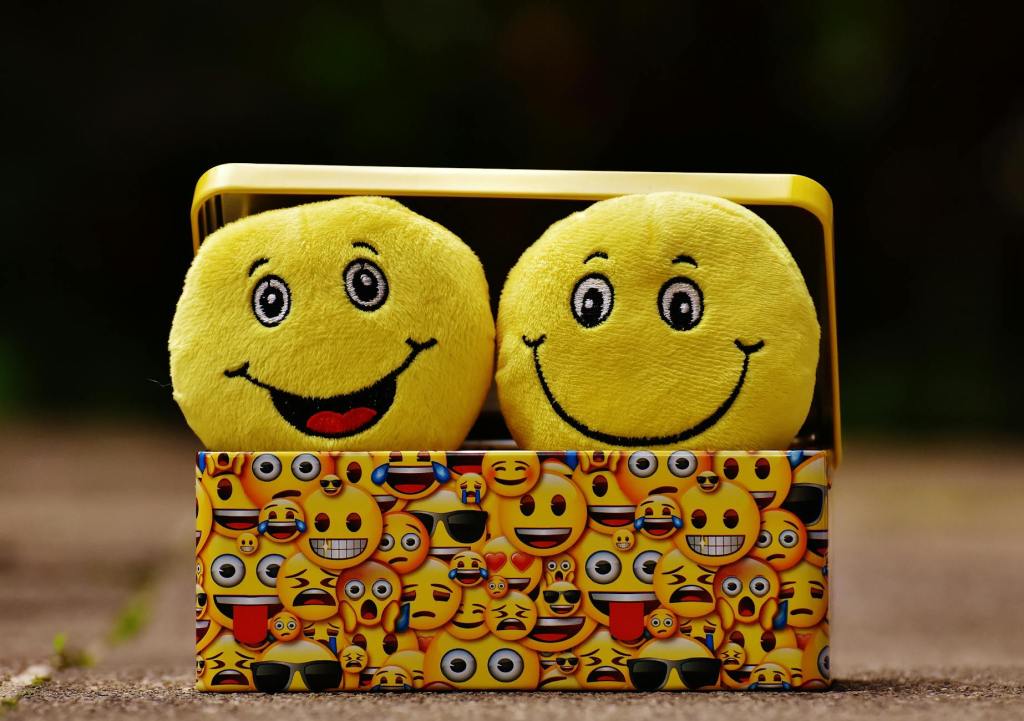 Decorative image of smiley faces meaning access friendly.